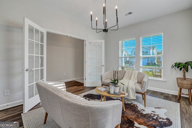 22 Allston Ln, Savannah, GA 31407 - living area with a chandelier, french doors, visible vents, and wood finished floors