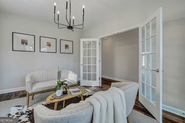22 Allston Ln, Savannah, GA 31407 - living area with baseboards, french doors, wood finished floors, and a notable chandelier