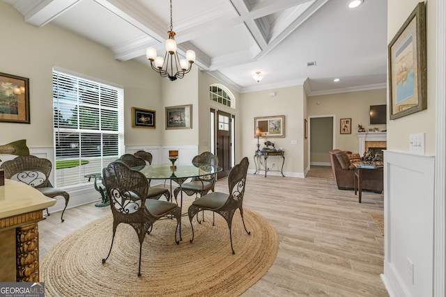 233 Cardinal Cir W, Saint Marys, GA 31558 - dining area with crown molding, light wood-type flooring, beam ceiling, coffered ceiling, and recessed lighting