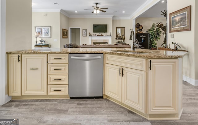 233 Cardinal Cir W, Saint Marys, GA 31558 - kitchen with a ceiling fan, a sink, cream cabinetry, and dishwasher