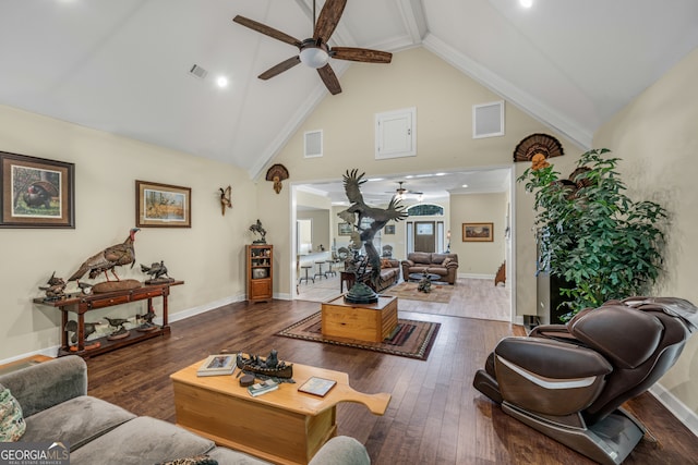 living room featuring ceiling fan, crown molding, dark hardwood / wood-style flooring, and high vaulted ceiling