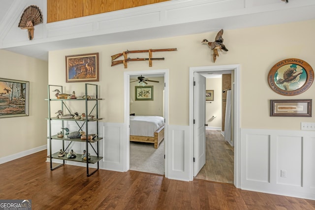 233 Cardinal Cir W, Saint Marys, GA 31558 - hall with a wainscoted wall, a decorative wall, and wood finished floors