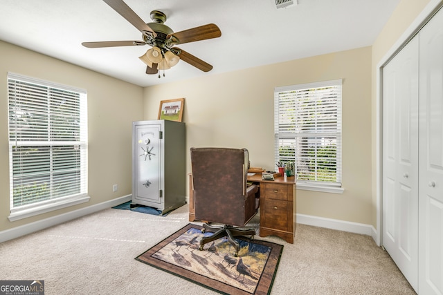 office with ceiling fan and light colored carpet