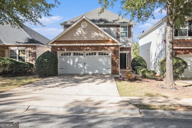 view of property featuring a garage