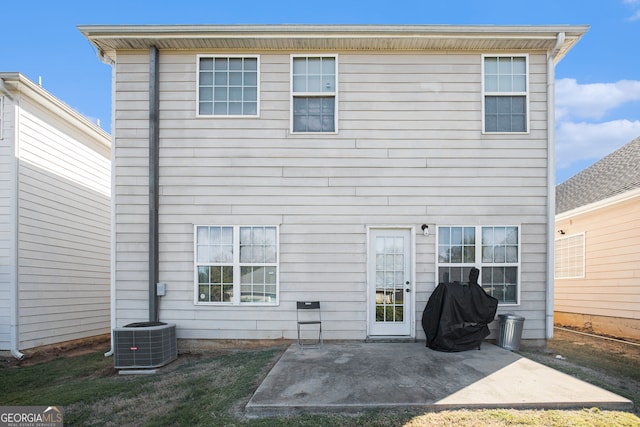 back of property with a patio area