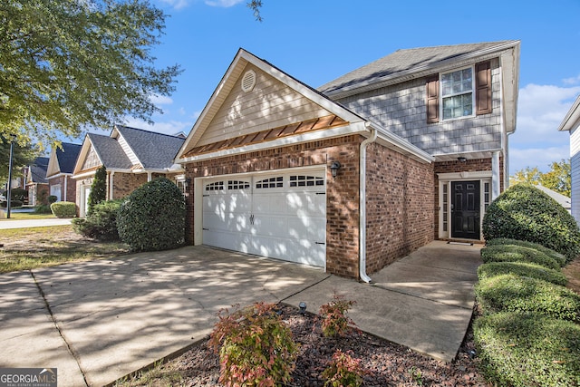 front of property featuring a garage