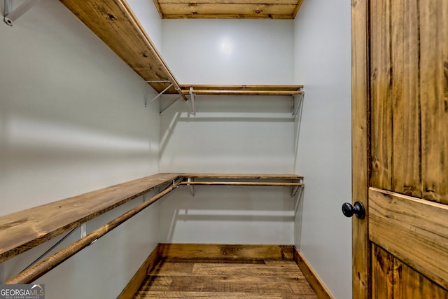 walk in closet featuring wood-type flooring