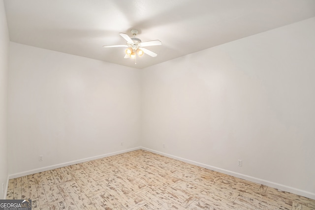 empty room featuring ceiling fan