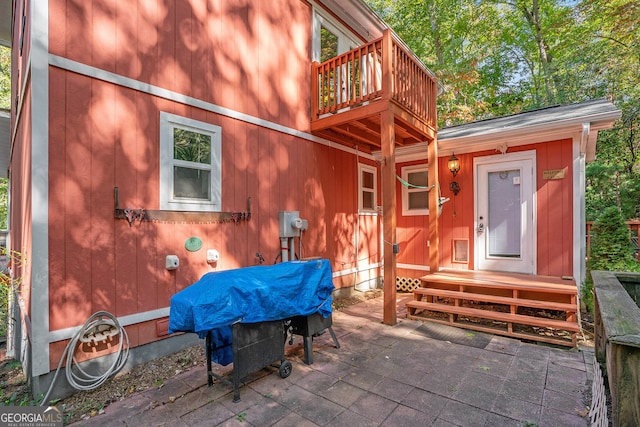 view of patio / terrace with a balcony