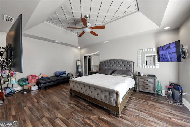 bedroom featuring ceiling fan and dark hardwood / wood-style flooring