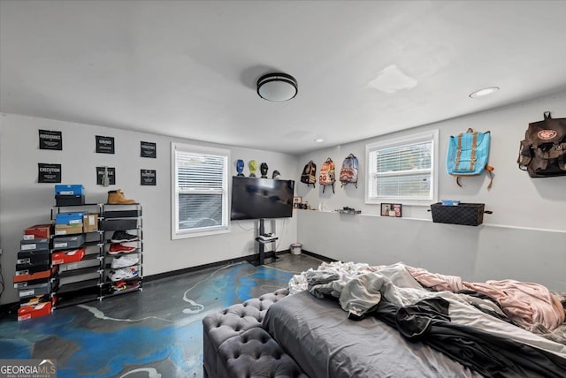 bedroom featuring multiple windows