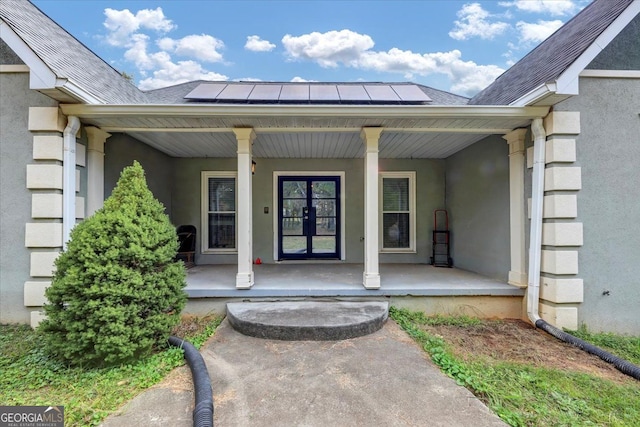 doorway to property featuring a porch