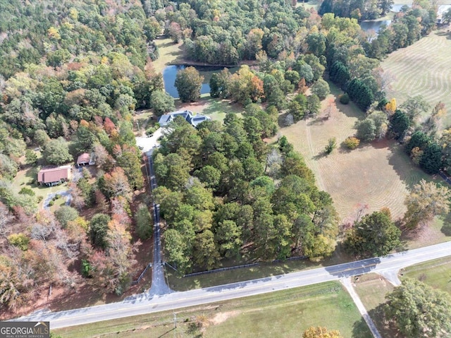 aerial view featuring a rural view and a water view