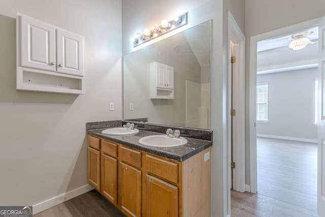 bathroom featuring vanity and wood-type flooring