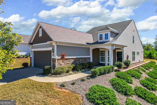 view of front of home with a porch and a garage