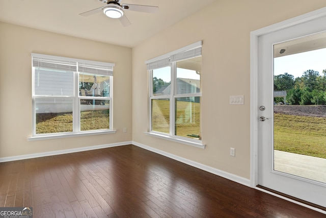 doorway featuring dark hardwood / wood-style floors and ceiling fan