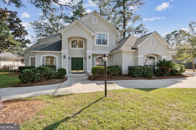 view of front of house with a front lawn