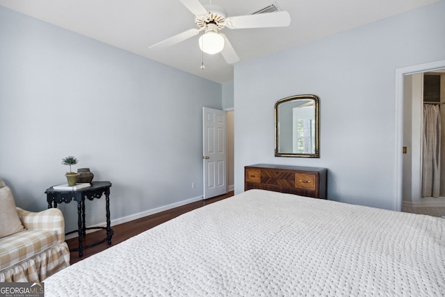 bedroom featuring dark wood-type flooring and ceiling fan