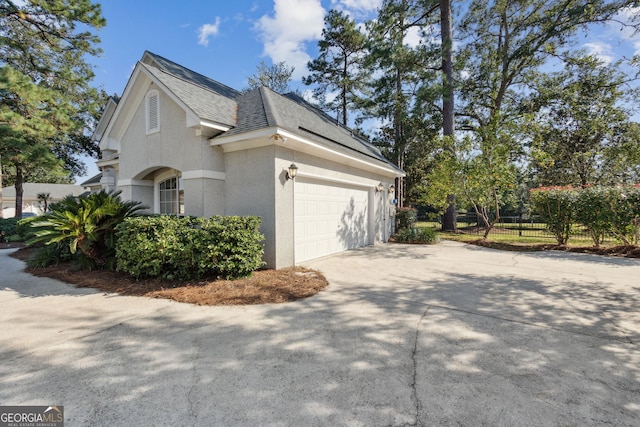 view of home's exterior featuring a garage