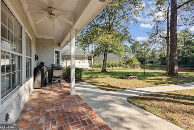 view of patio / terrace featuring a grill and ceiling fan