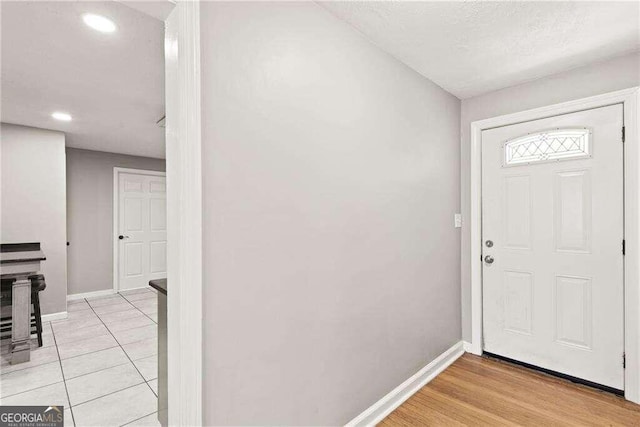 foyer entrance featuring light hardwood / wood-style flooring