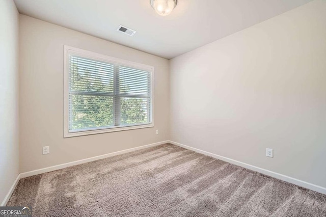 view of carpeted spare room