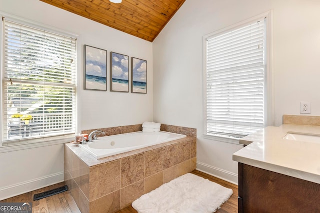 bathroom featuring lofted ceiling, wood ceiling, and plenty of natural light