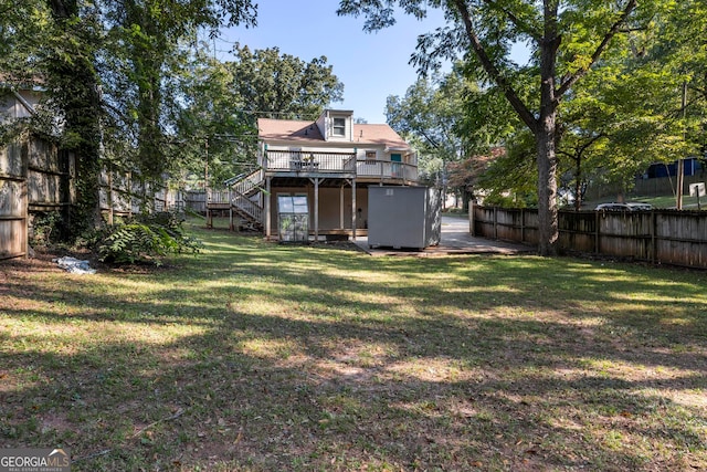 view of yard with a deck