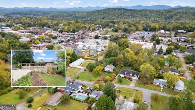 bird's eye view with a mountain view