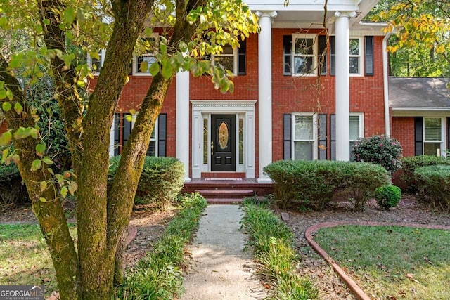 view of greek revival inspired property