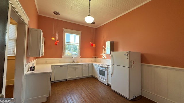 kitchen with crown molding, hanging light fixtures, and white appliances