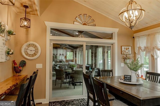 dining space featuring wood ceiling, a notable chandelier, vaulted ceiling, and crown molding