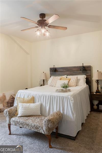 bedroom with carpet floors and ceiling fan