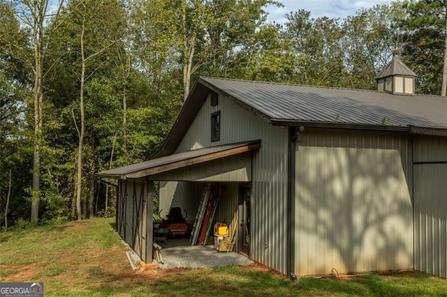 exterior space featuring a carport