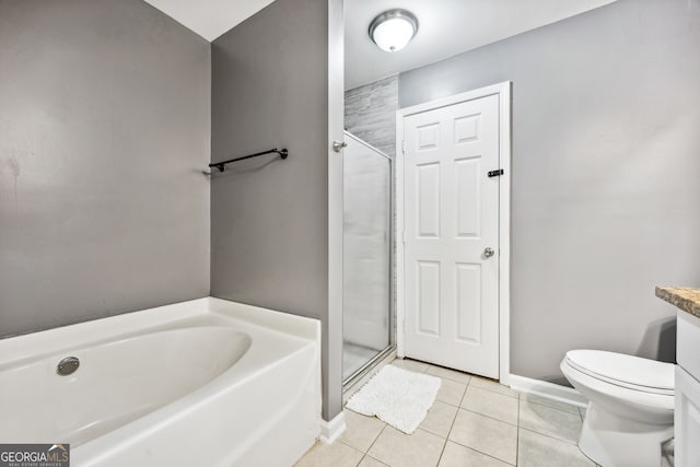 full bathroom featuring tile patterned flooring, shower with separate bathtub, vanity, and toilet