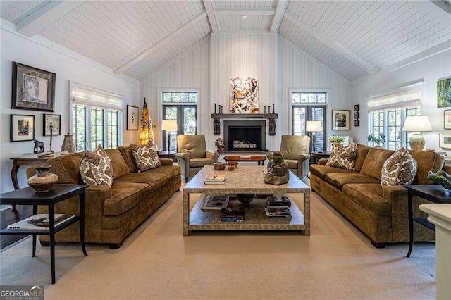 carpeted living room featuring beam ceiling, high vaulted ceiling, and wooden ceiling