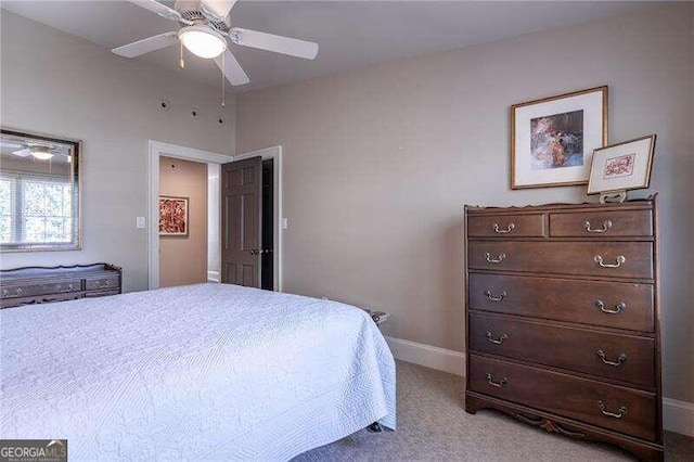 bedroom with light carpet and ceiling fan