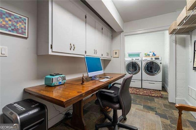 office area with washer and clothes dryer