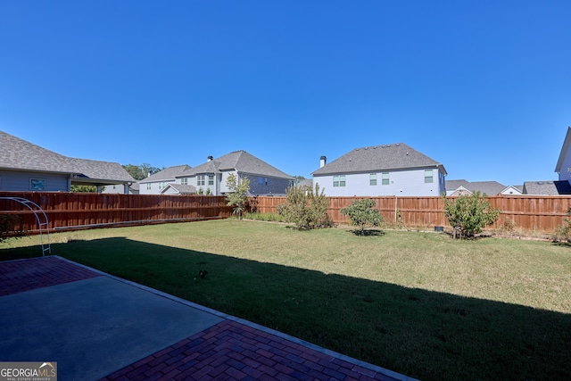 view of yard with a patio area