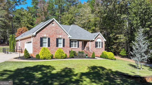 view of front of house with a front lawn and a garage