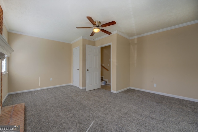 carpeted spare room with crown molding and ceiling fan