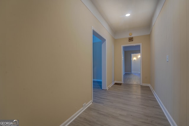 hallway featuring light hardwood / wood-style flooring