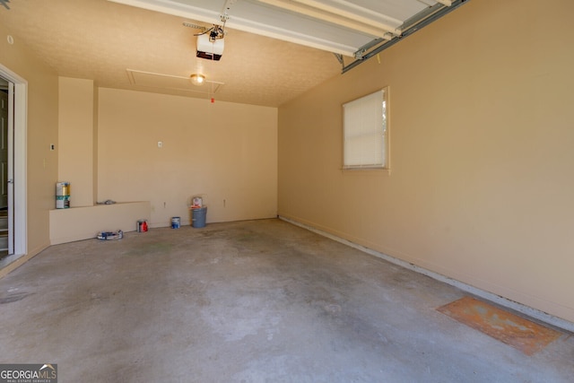 garage featuring a garage door opener