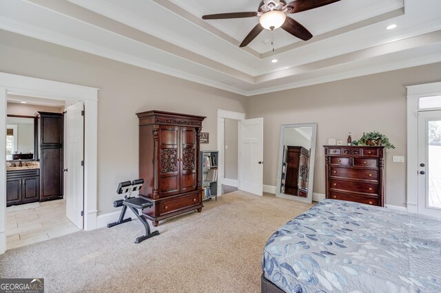 bedroom with ceiling fan, ensuite bath, crown molding, and light colored carpet