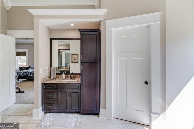 bathroom featuring vanity and tile patterned flooring