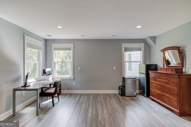 home office featuring light wood-type flooring