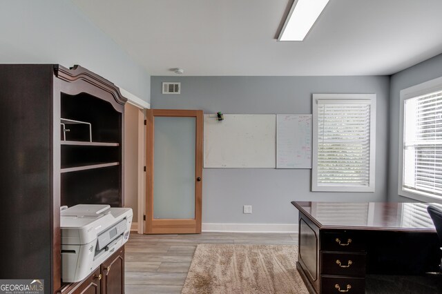 office featuring light hardwood / wood-style floors