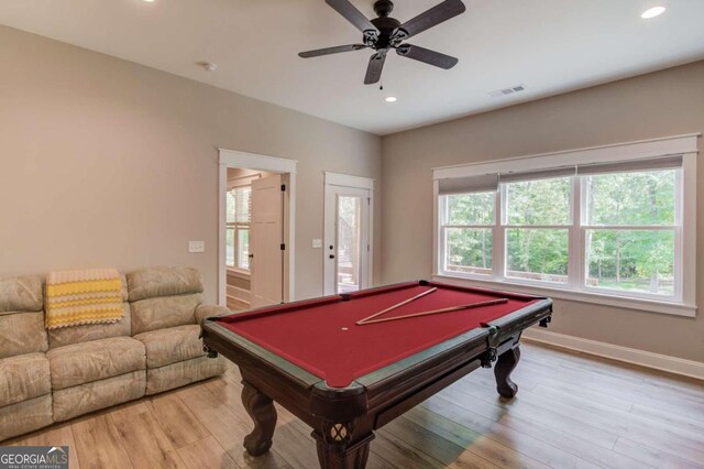 game room with billiards, hardwood / wood-style flooring, and a healthy amount of sunlight