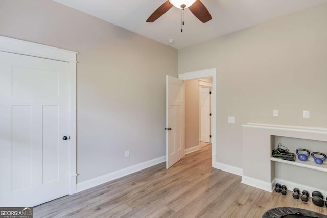 interior space with light hardwood / wood-style floors and ceiling fan