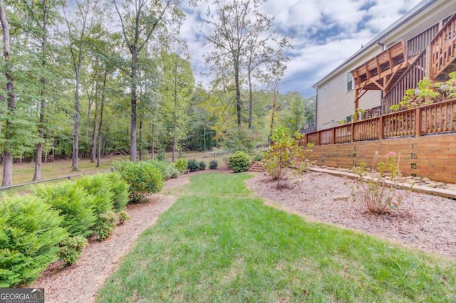 view of yard with a deck